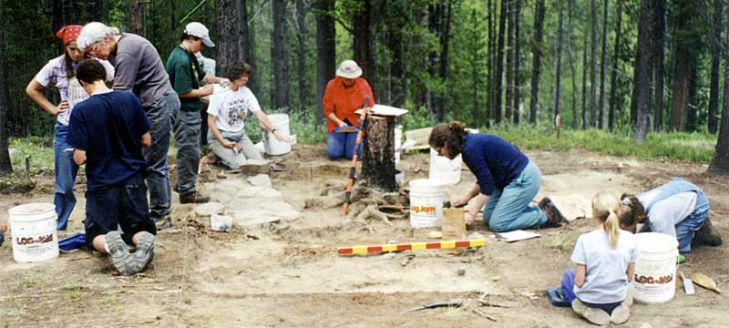 PIT volunteers uncover a hearth and small artifacts at the looted Fook Sing Company Mining Camp, 2001.
